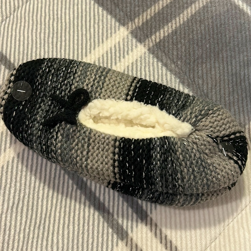 Grey and black knitted slippers